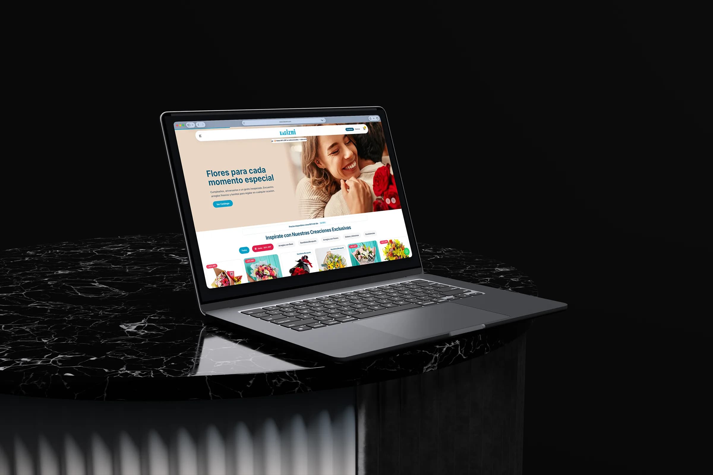 Karizmi flower and gift storefront displayed on a laptop above a black marble pedestal.